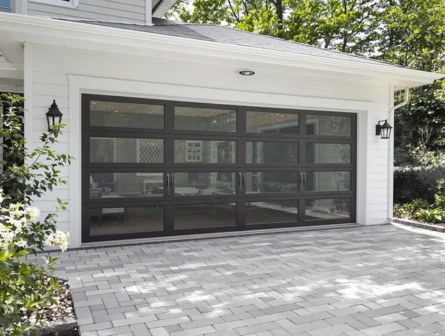 Stafford Garage Door Repair design specialist presenting custom garage door options to Stafford homeowner