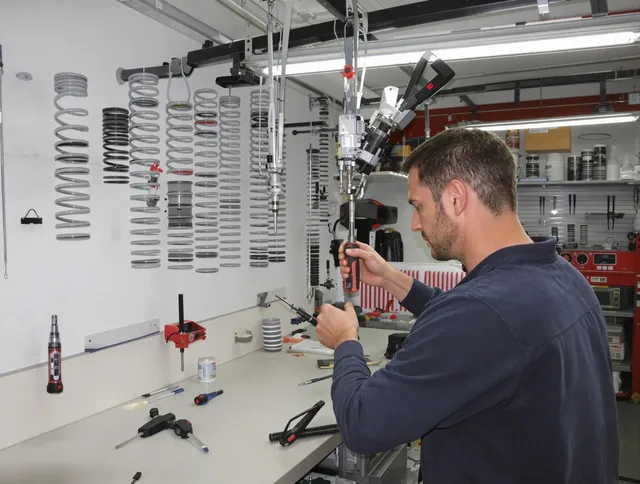 Stafford Garage Door Repair safety certified technician performing precision spring replacement in Stafford
