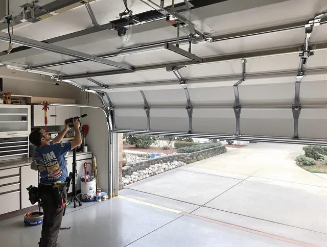 Garage door track repair service by Stafford Garage Door Repair in Stafford